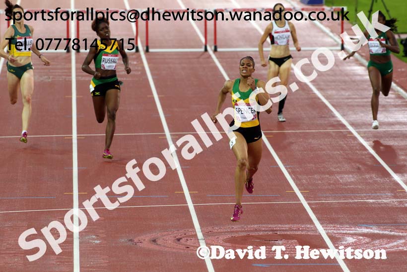 Kaliese Spencer (Jamaica) wins the 400 metres hurdles at the Commonwealth Games, Glasgow. Photo: David T. Hewitson/Sports for All Pics